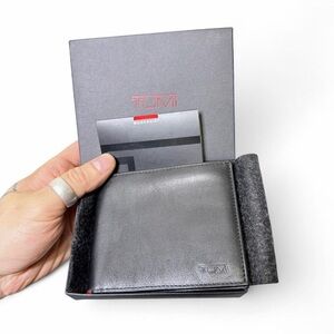 Tumi black leather wallet